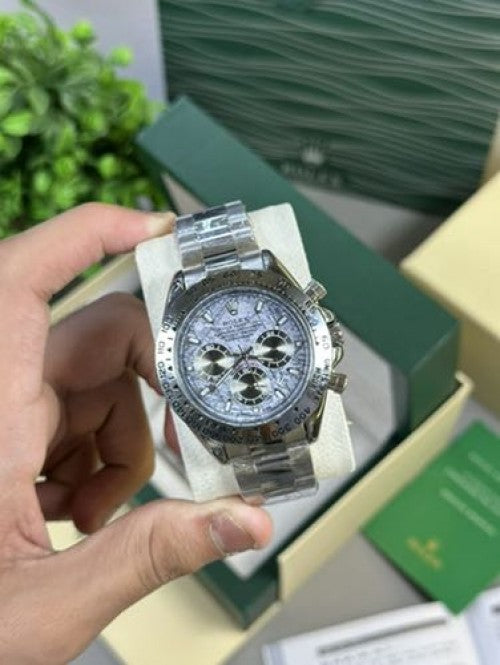 ROLEX DAYTONA SWIFT MOUMENT