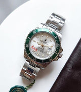 Rolex Oyster Perpetual Submarine Green Bazel
